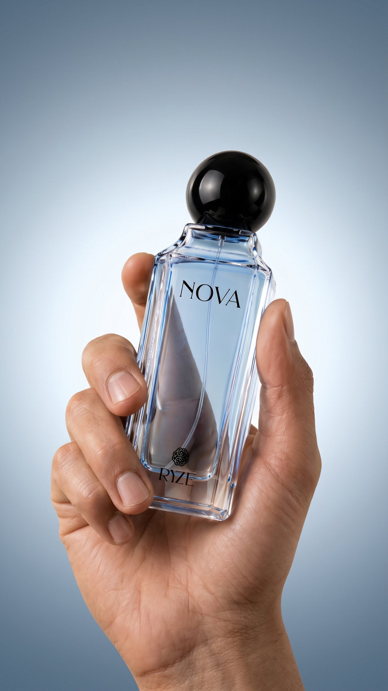 Hand holding the Nova fragrance bottle